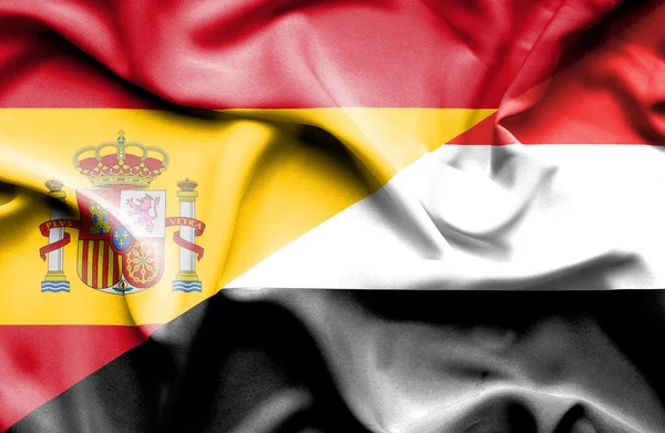 Jemens og Spanias flagg – stockfoto