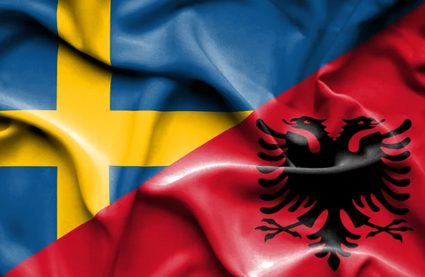 Vlající vlajka Albánie a Švédska — Stock fotografie