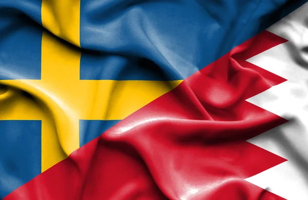 Vlající vlajka Bahrajnu a Švédska — Stock fotografie