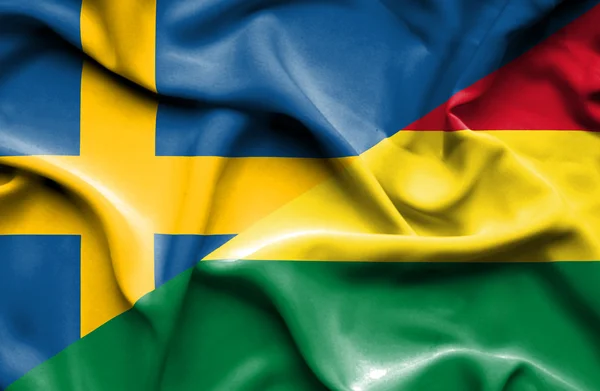 Bandiera sventolante di Bolivia e Svezia — Foto Stock