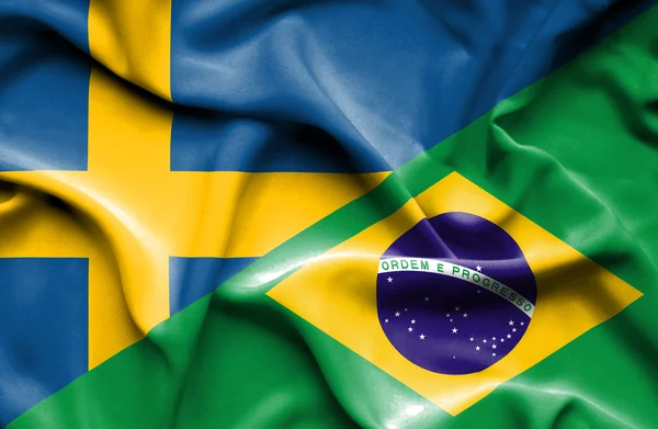 Bandeira acenando do Brasil e da Suécia — Fotografia de Stock