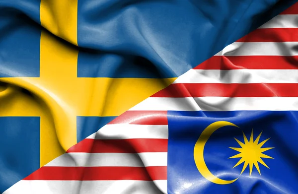 Waving flag of Malaysia and Sweden — Stock Photo, Image