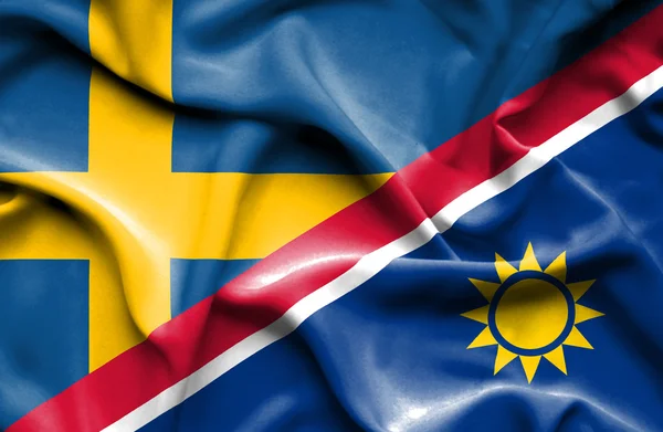 Wapperende vlag van Namibië en Zweden — Stockfoto