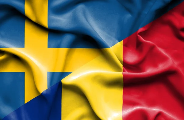 Waving flag of Romania and Sweden — Stock Photo, Image