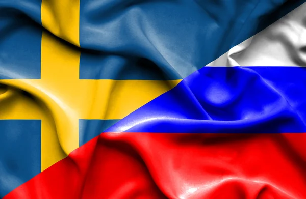 Waving flag of Russia and Sweden — Stock Photo, Image