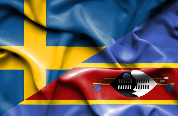 Waving flag of Swazliand and Sweden — Stock Photo, Image