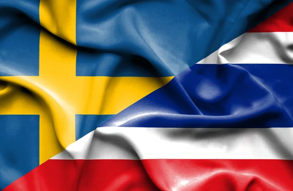 Bandeira ondulada da Tailândia e Suécia — Fotografia de Stock