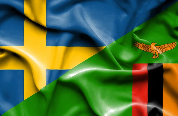 Viftande flagga i zimbabwe och Sverige — Stockfoto