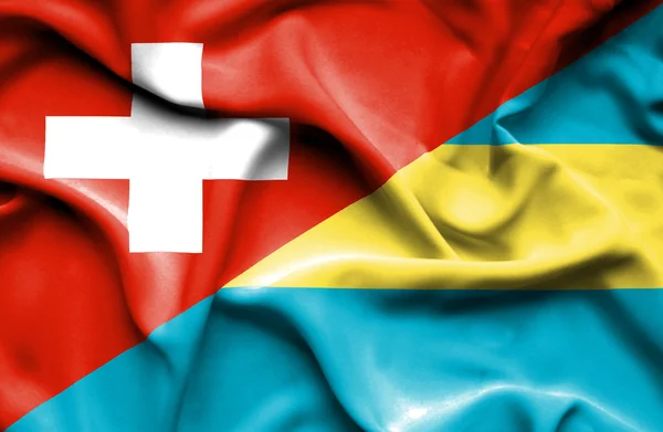 Sventolando bandiera di Bahamas e Svizzera — Foto Stock