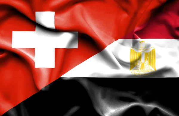 Flagge Ägyptens und der Schweiz schwenken — Stockfoto