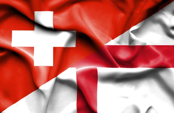 英国和瑞士的那飘扬的旗帜 — 图库照片