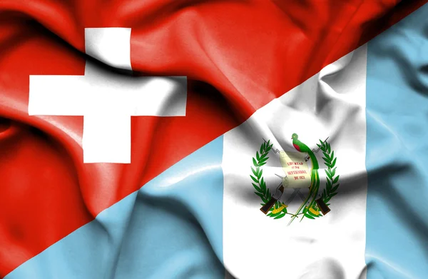 Bandera ondeante de Guatemala y Suiza —  Fotos de Stock