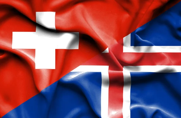 Sventolando bandiera di Islanda e Svizzera — Foto Stock