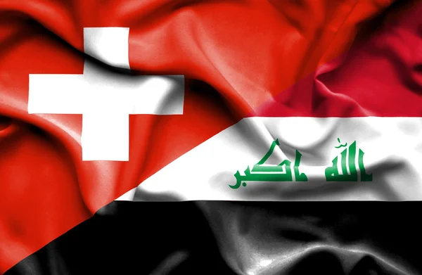 Flagge des Irak und der Schweiz schwenken — Stockfoto