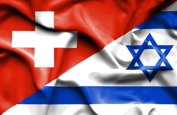 Waving flag of Israel and Switzerland — Stock Photo, Image