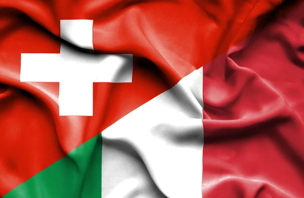 Bandera ondeante de Italia y Suiza — Foto de Stock