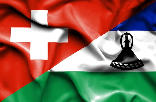 Integetett zászló lesotho és Svájc — Stock Fotó