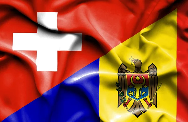 Bandera ondeante de Moldavia y Suiza —  Fotos de Stock
