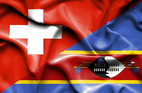 Sventolando bandiera dello Swazliand e della Svizzera — Foto Stock