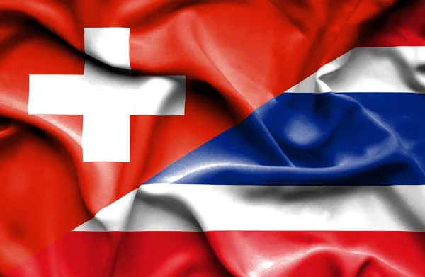 Bandeira ondulada da Tailândia e Suíça — Fotografia de Stock