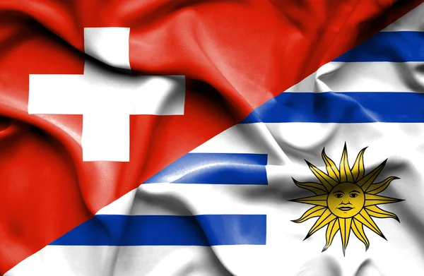 Bandiera sventolante di Uruguay e Svizzera — Foto Stock