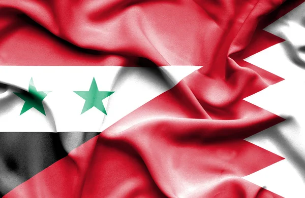 Waving flag of Bahrain and Syria — Stock Photo, Image