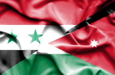 Ürdün ve Suriye bayrağı sallayarak