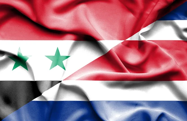 Costa rica och Syrien viftande flagga — Stockfoto