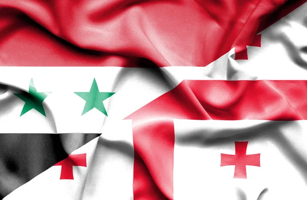 Waving flag of Georgia and Syria — Stock Photo, Image