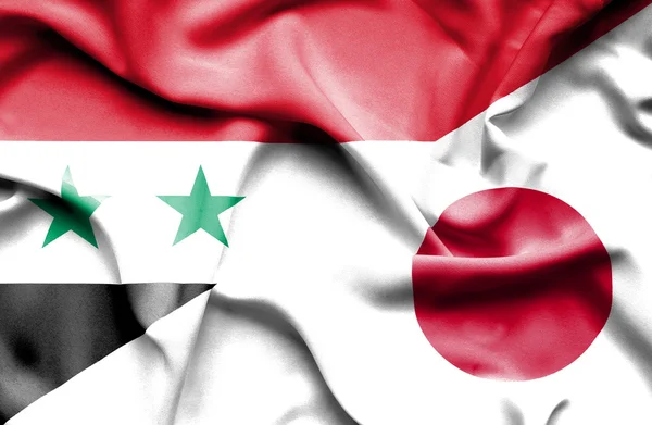 Wapperende vlag van japan en Syrië — Stockfoto