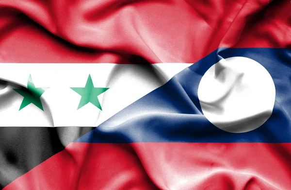 Laos och Syrien viftande flagga — Stockfoto