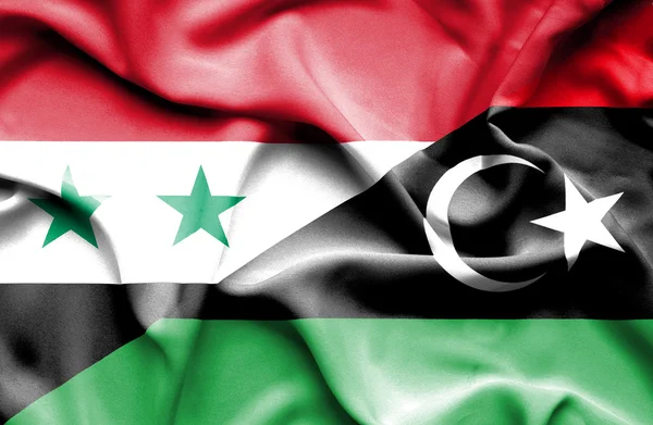 Libyen och Syrien viftande flagga — Stockfoto