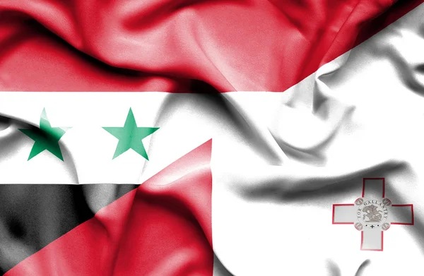 Wapperende vlag van malta en Syrië — Stockfoto