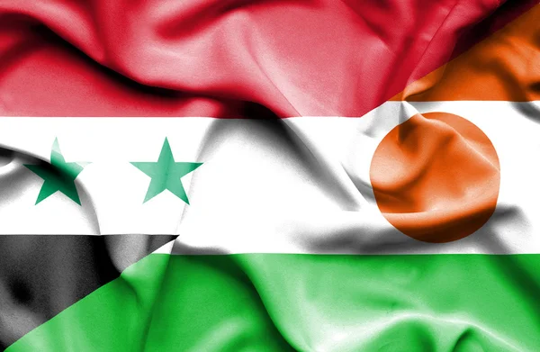 Niger och Syrien viftande flagga — Stockfoto