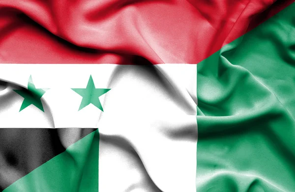 Waving flag of Nigeria and Syria — Stock Photo, Image