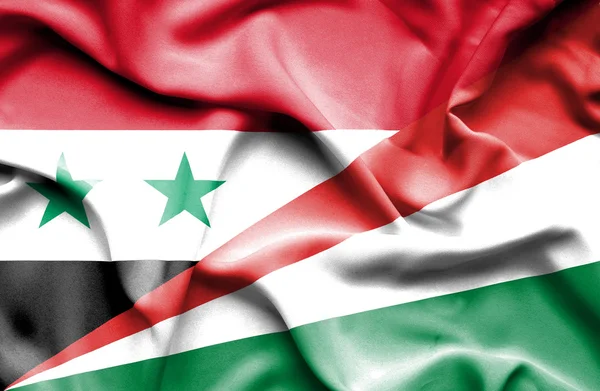 Wapperende vlag van Seychellen en Syrië — Stockfoto