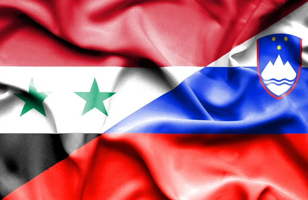 Wapperende vlag van Slovenië en Syrië — Stockfoto