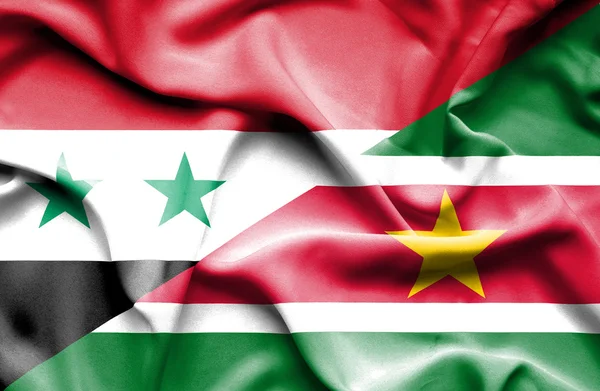 Viftande flagga Surinam och Syrien — Stockfoto