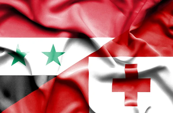 Tonga och Syrien viftande flagga — Stockfoto