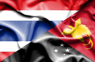 papua Yeni Gine ve Tayland bayrağı sallayarak