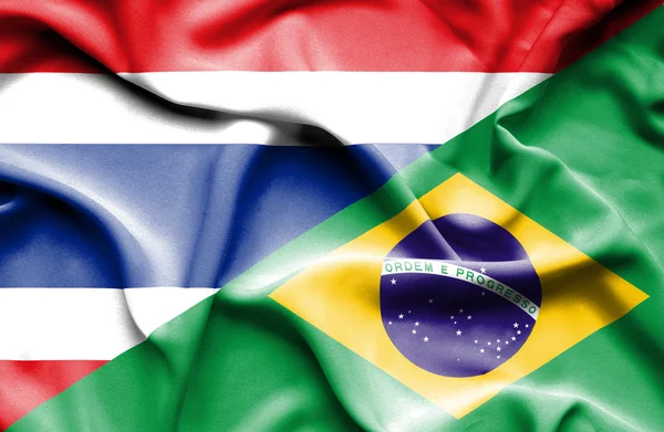 Bandeira acenando do Brasil e da Tailândia — Fotografia de Stock