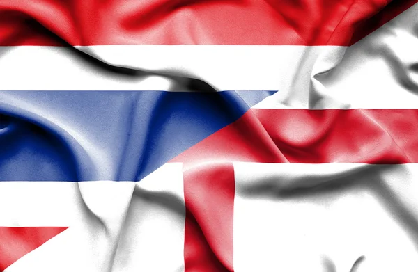 Anglia és Thaiföld hullámzó zászlaja — Stock Fotó