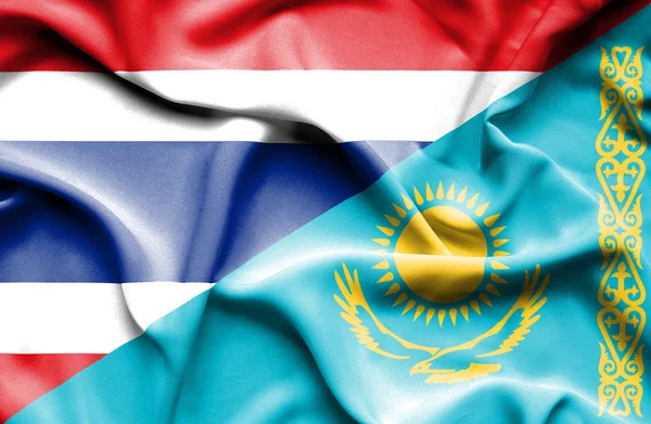 Waving flag of Kazakhstan and Thailand — Stock Photo, Image