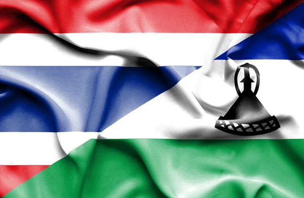 Bandiera sventolante del Lesotho e Thailandia — Foto Stock