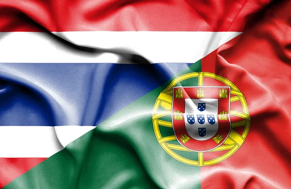Waving flag of Portugal and Thailand — Stock Photo, Image