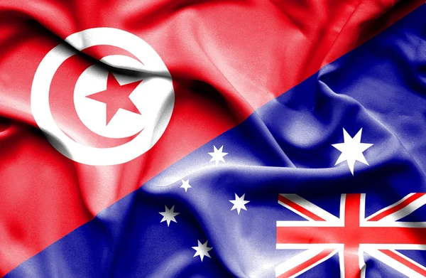 Waving flag of Australia and Tunisia — Stock Photo, Image