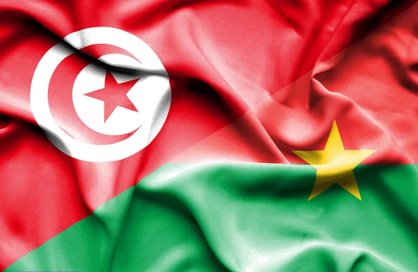 Waving flag of Burkina Faso and Tunisia — Stock Photo, Image