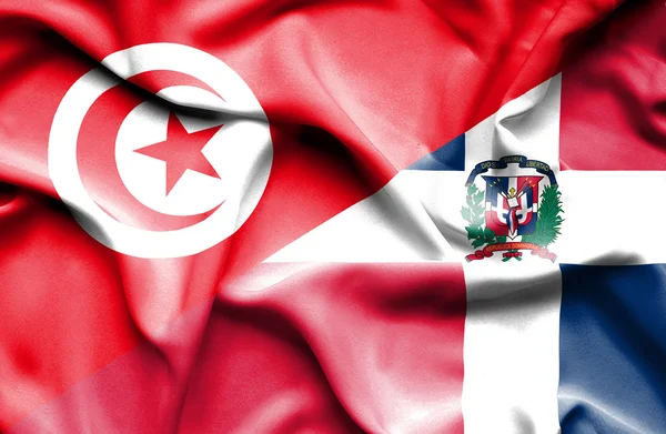 Waving flag of Dominican Republic and Tunisia — Stock Photo, Image