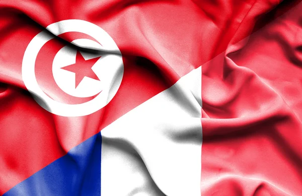 Waving flag of France and Tunisia — Stock Photo, Image