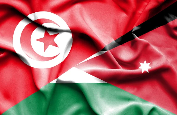 Wapperende vlag van Jordanië en Tunesië — Stockfoto